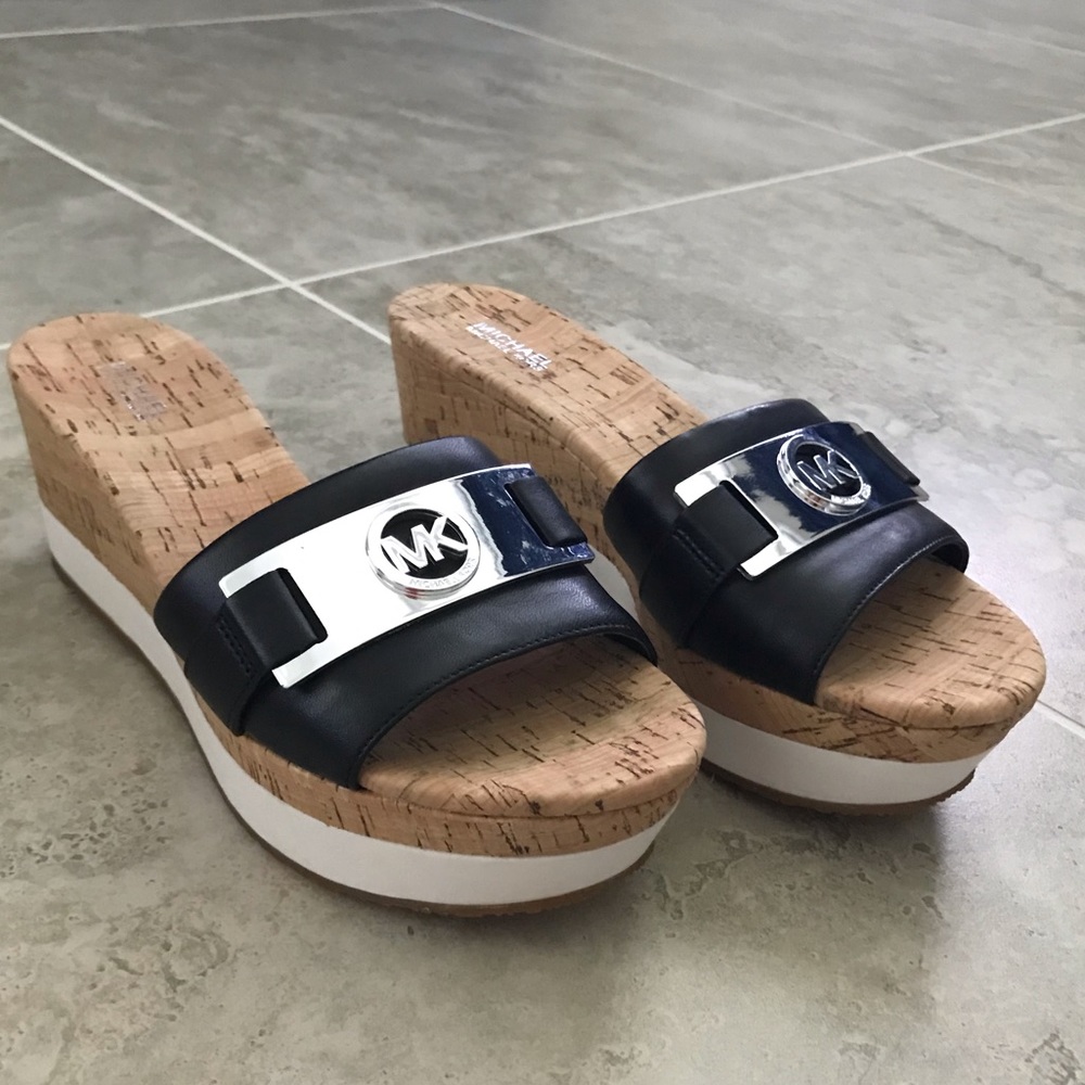 Brand new Michael Kors black Warren Wedges
